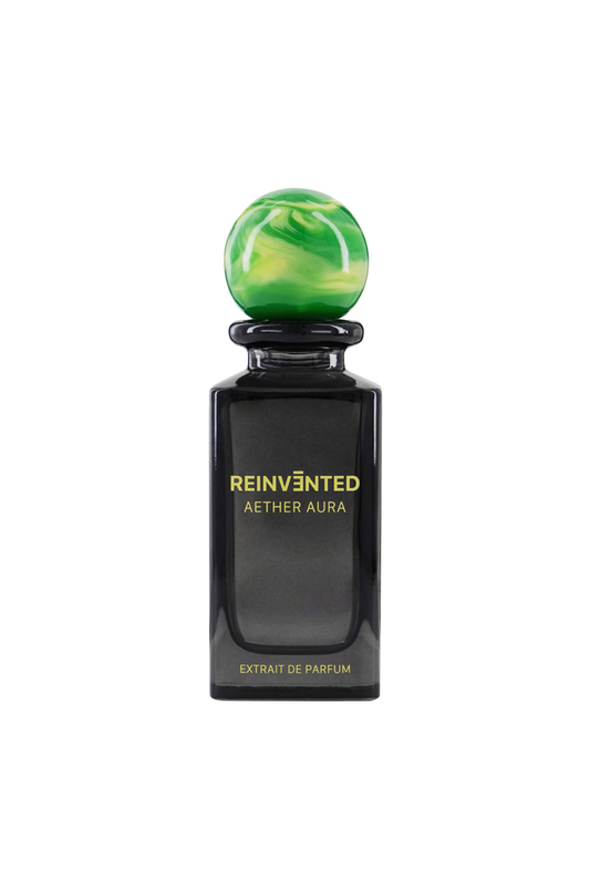 Perfume bottle labeled 'Reinvented Aether Aura' with a green cap on a white background